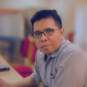 Edria Sandika, M.Hum.